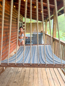 Hot tub and hammock at Sevierville cabin rental