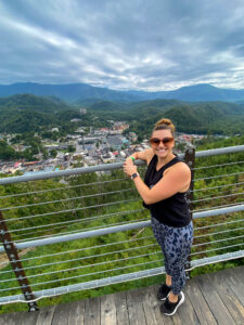 Downtown Gatlinburg Parkway with Smoky Mountains in the background on Skybridge