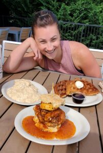 Asiago-Bacon Waffle and fried chicken biscuit from Maple Street Biscuit Company — best brunch in Birmingham AL