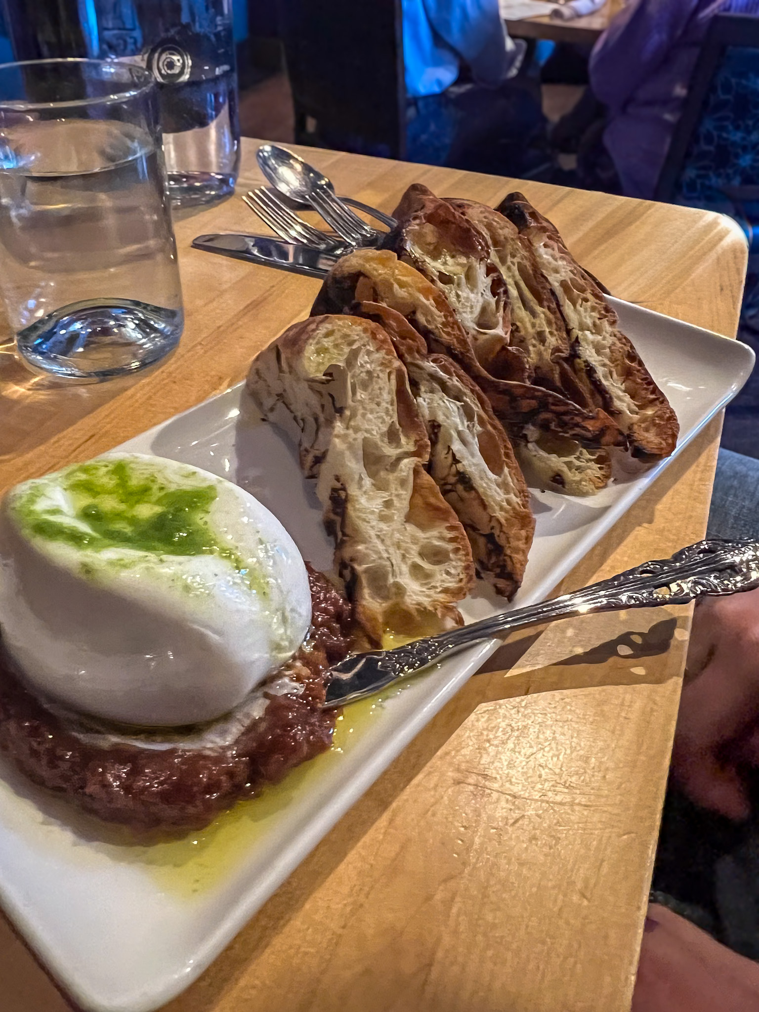 Alavita Boise Review featuring burrata starter with local bread