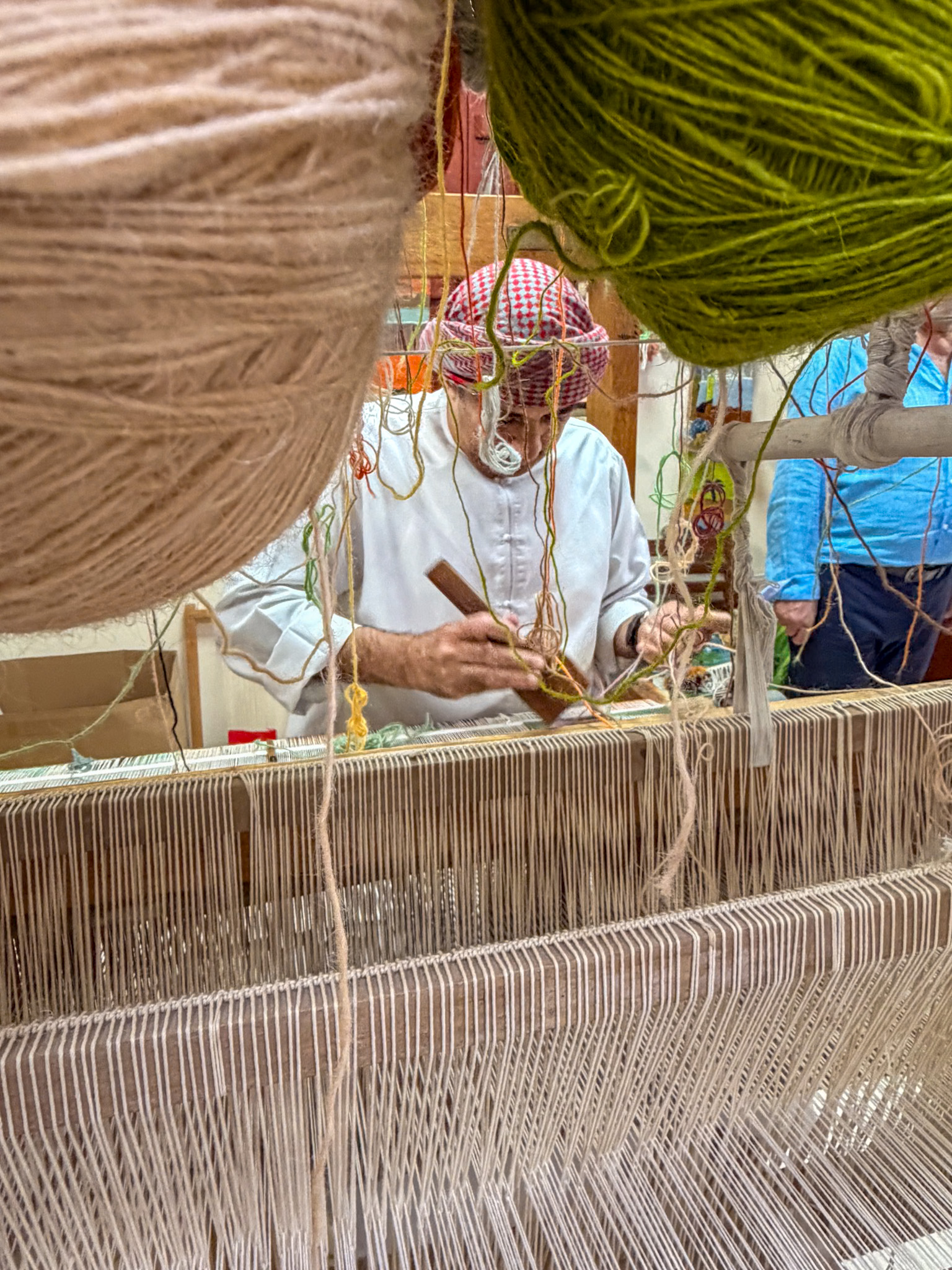 Rug making demonstration at Heritage Village Abu Dhabi