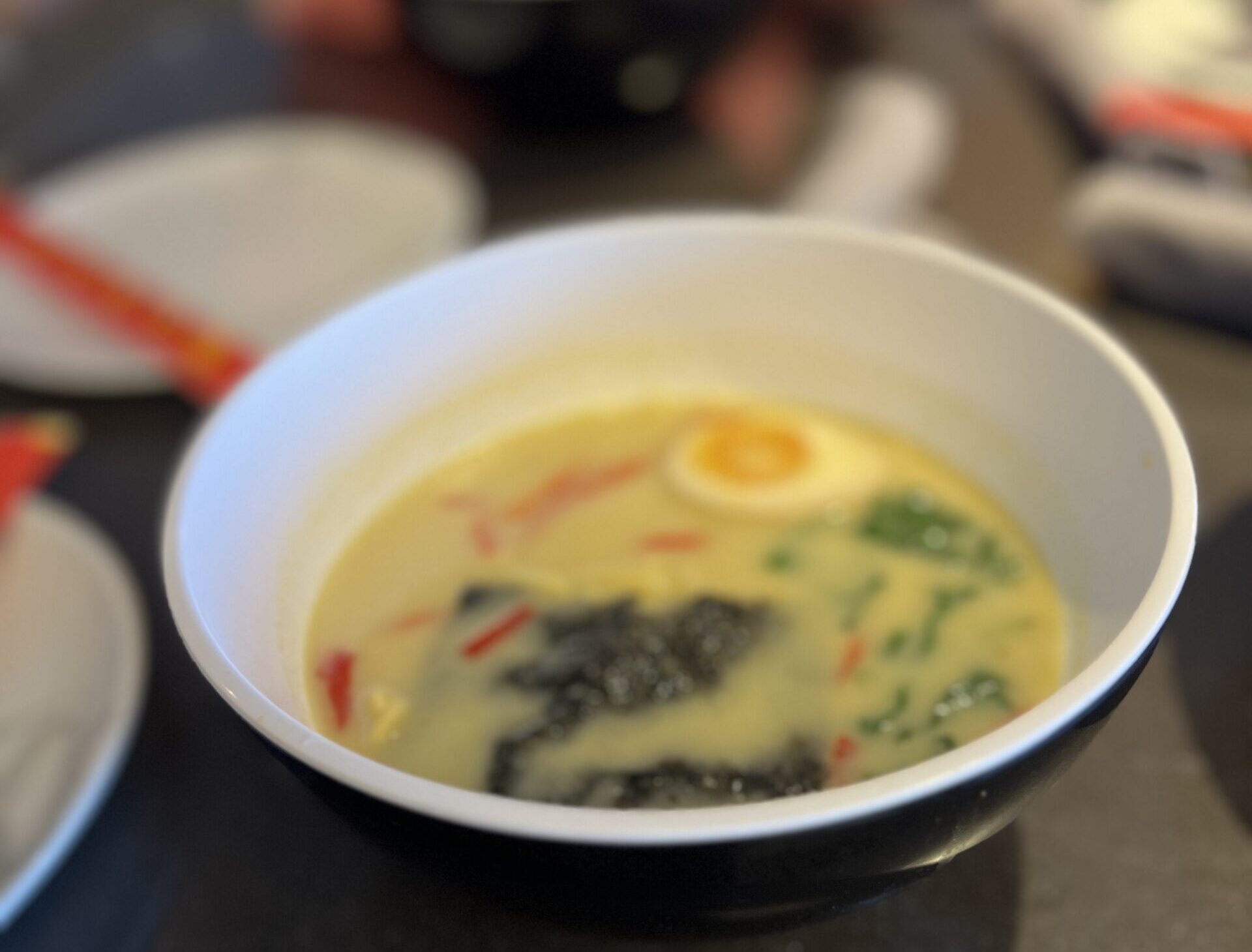 Virgin Voyages restaurant guide showing Sun Club Café bao buns and bowls