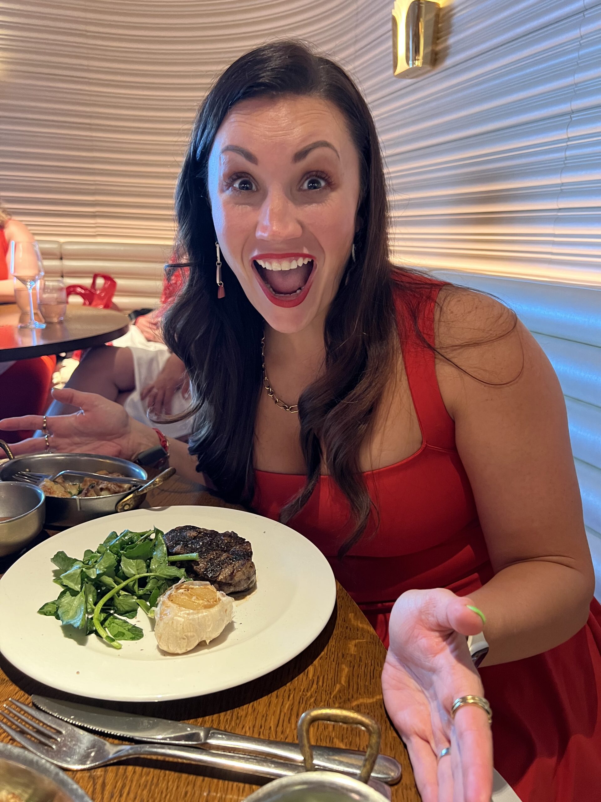 Virgin Voyages restaurant guide featuring The Wake filet mignon and steakhouse sides