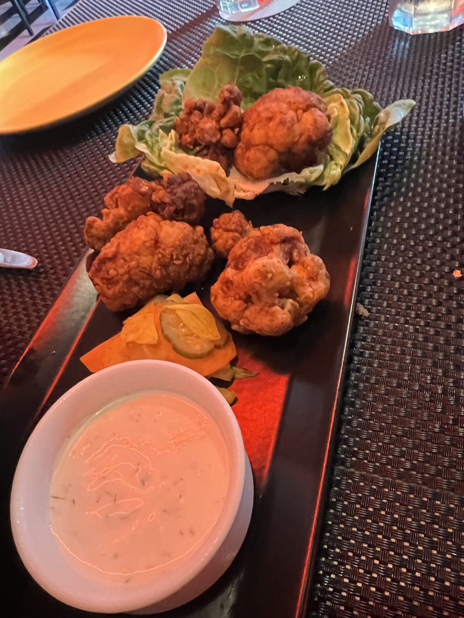 Virgin Voyages restaurant guide showing Razzle Dazzle brunch smoked bacon