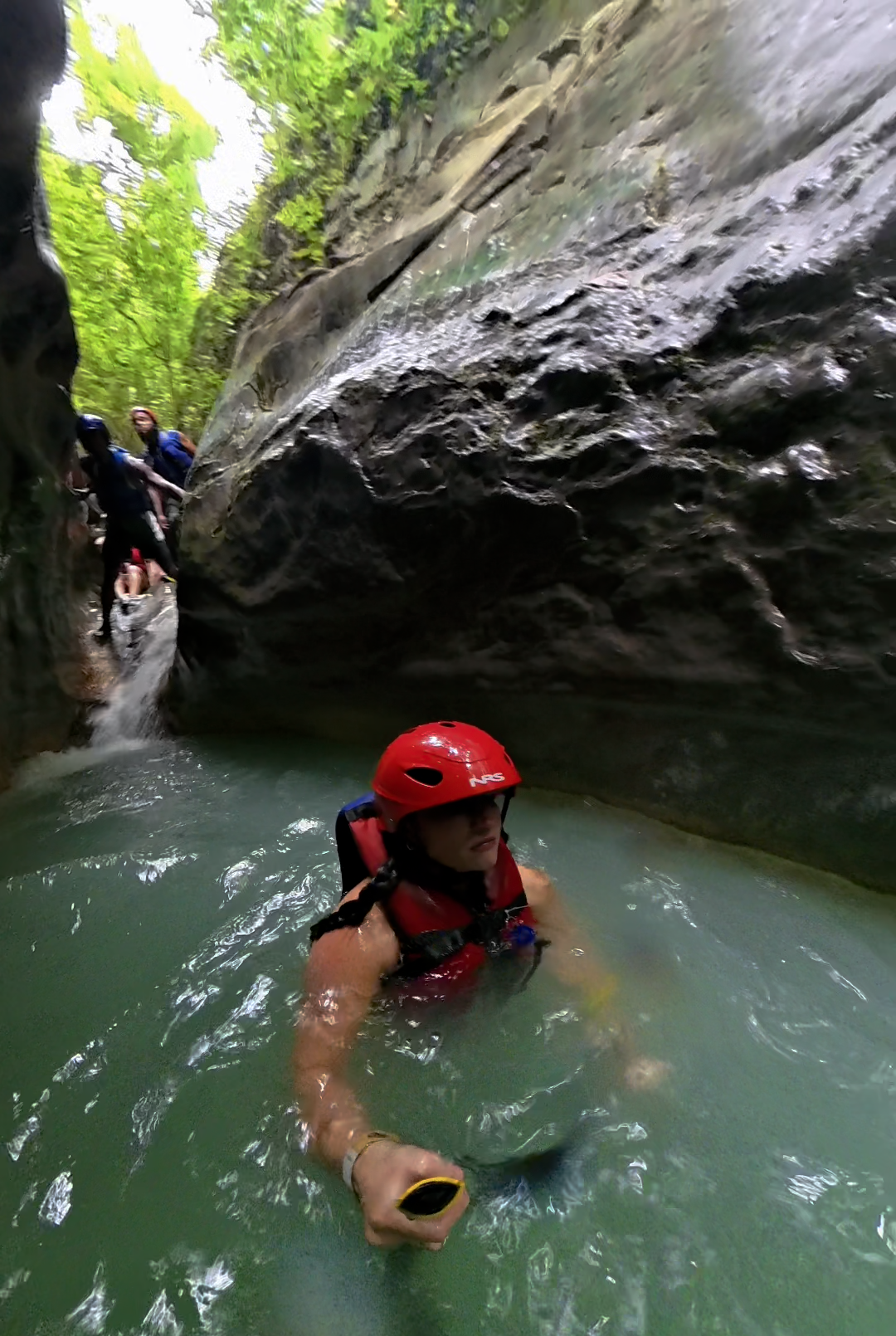 Sliding down rocks at the Waterfalls of Damajagua in Puerto Plata