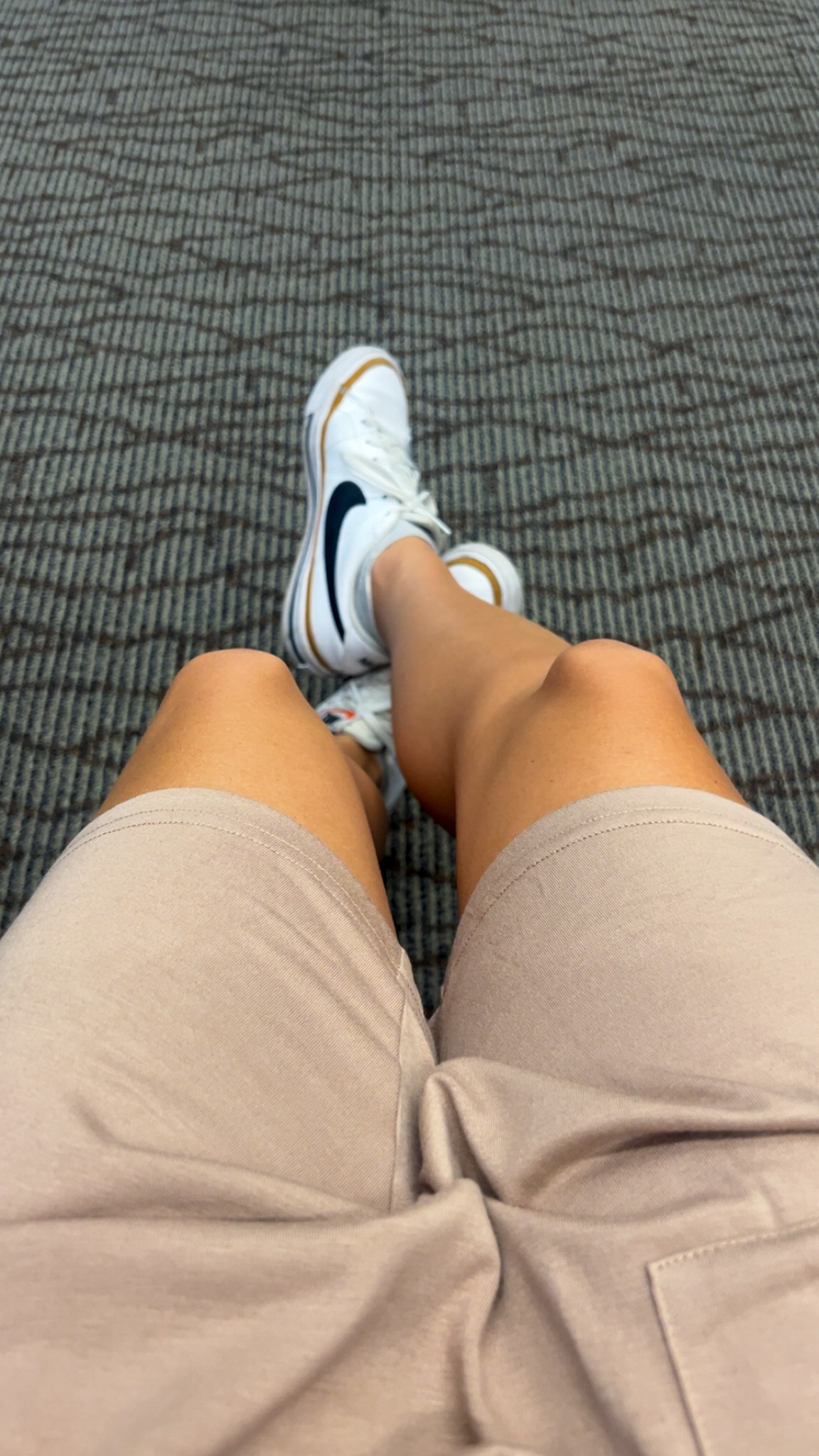 traveler checking phone during layover time connection