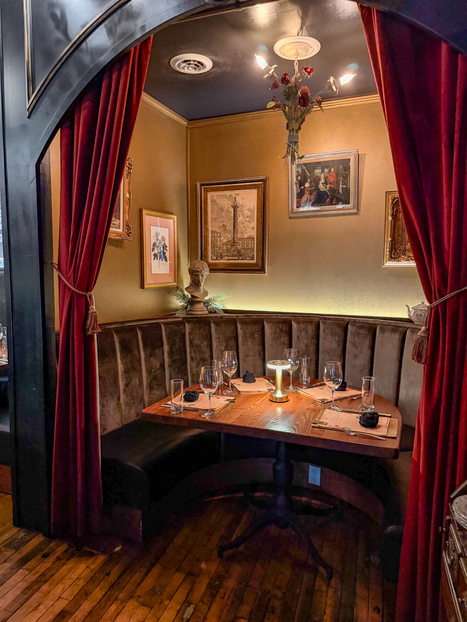 Osteria Stella Knoxville dining room with dark moody lighting