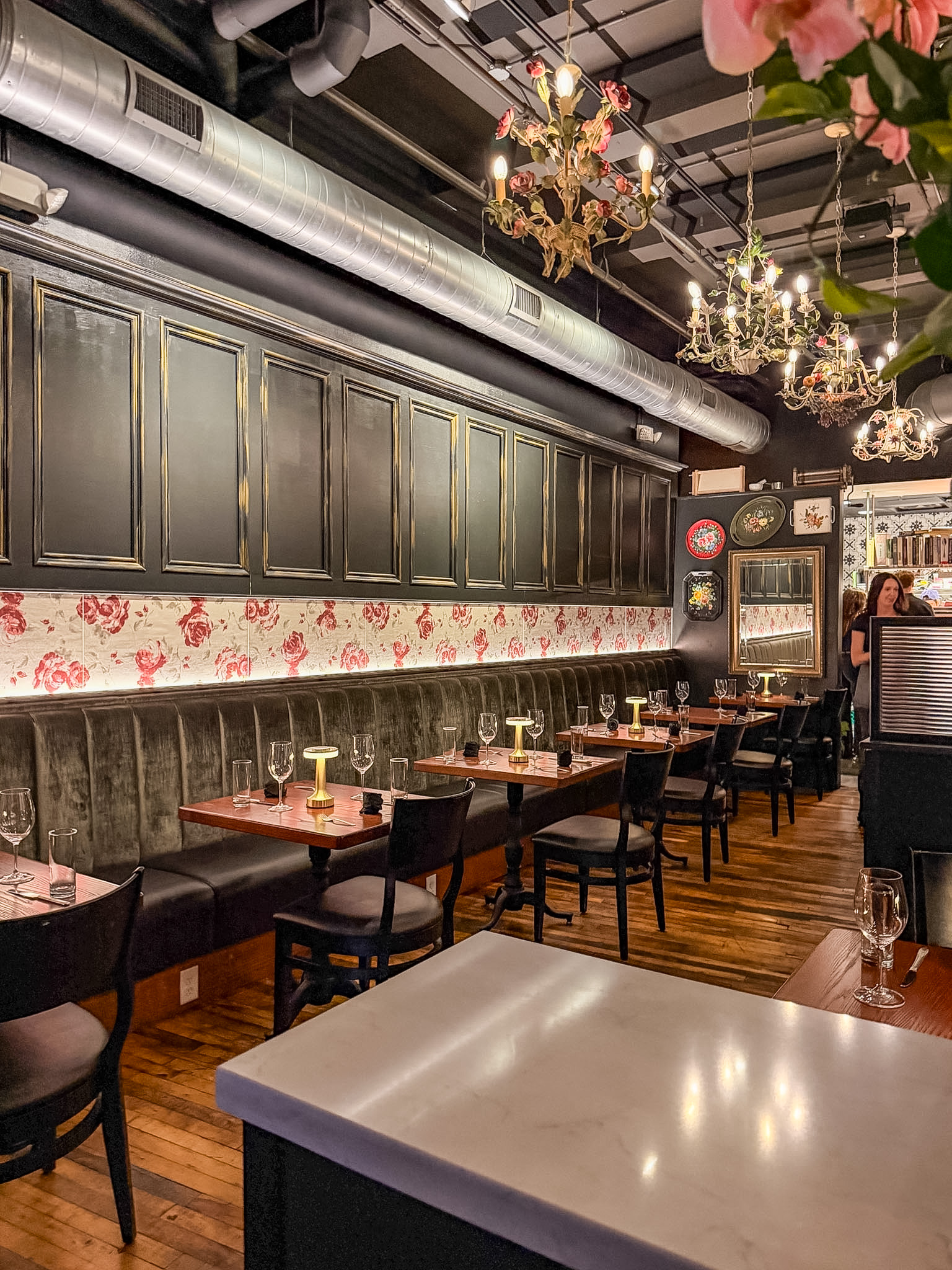 Osteria Stella Knoxville dining room with dark moody lighting