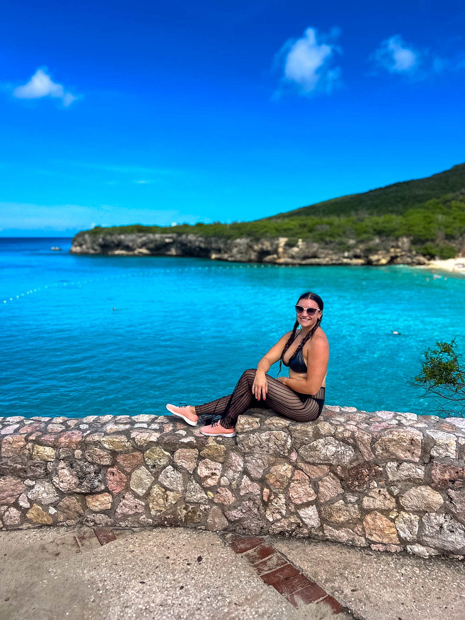 What to Pack for Curaçao water shoes on rocky beach entry