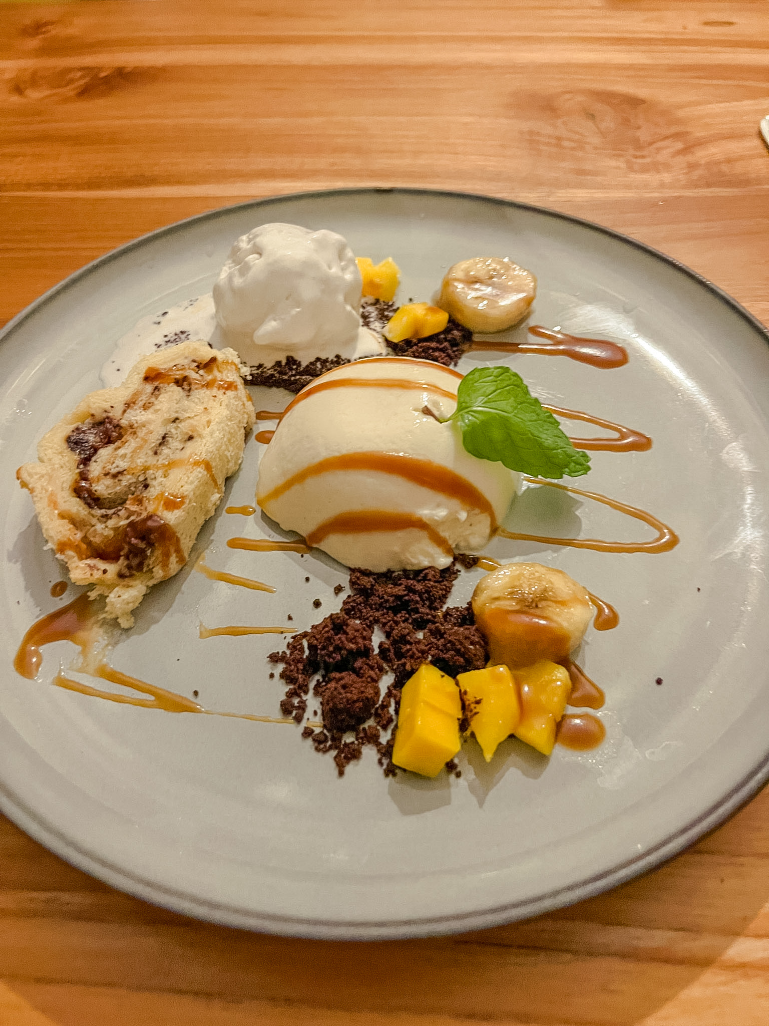 Fort Nassau Curaçao white chocolate vanilla bombe dessert with fruit