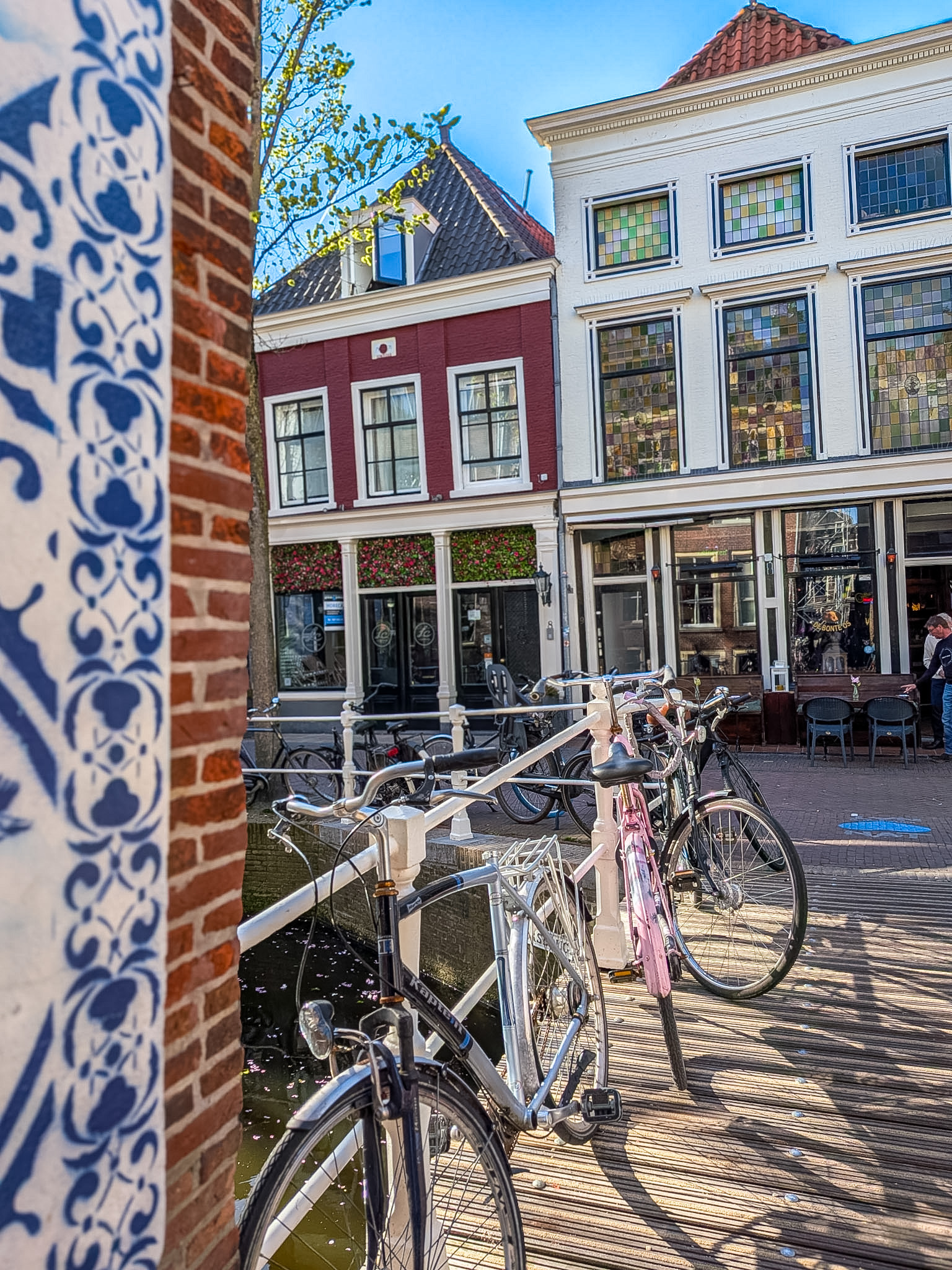 Historic canals and cafés while exploring things to do in Delft Netherlands
