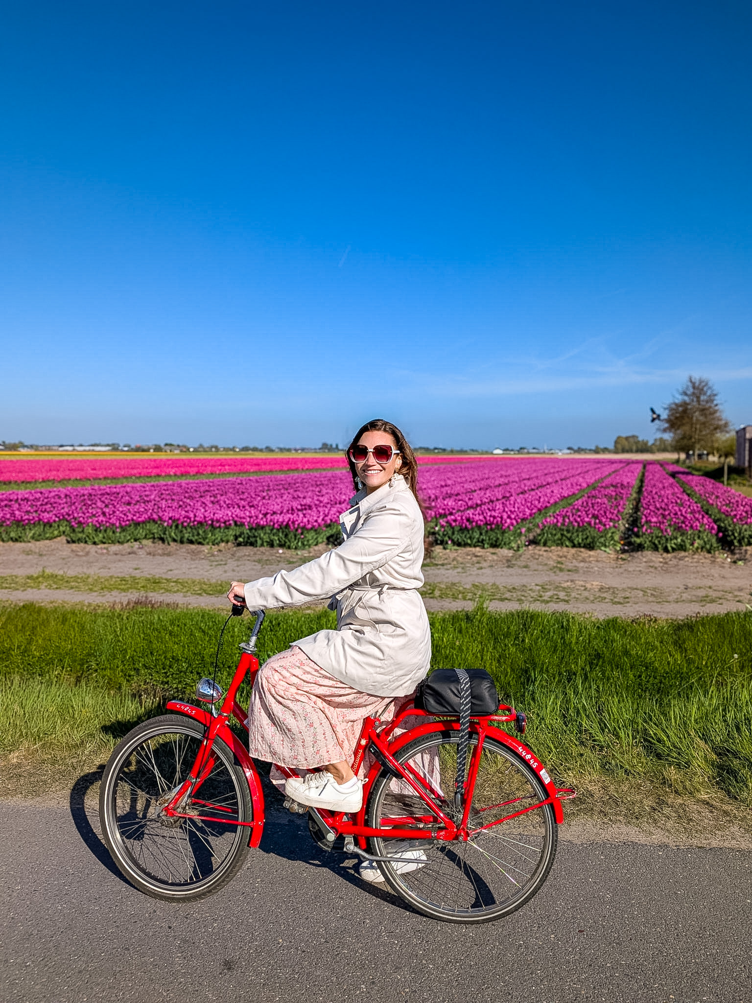Biking outfit example for what to wear in the tulip fields Netherlands in windy weather