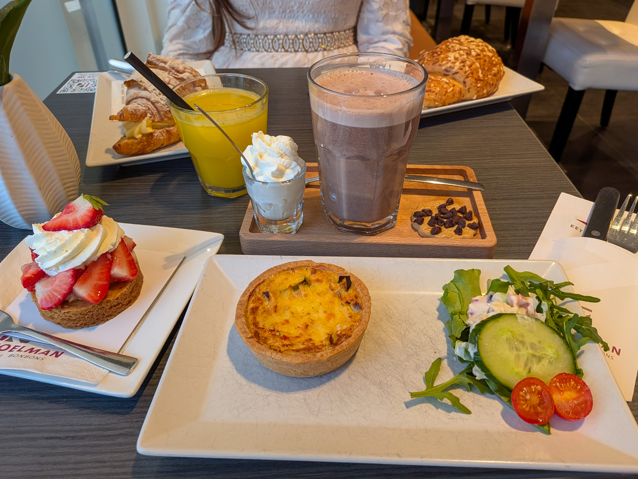 Breakfast spread at Wim Koelman Bakery Heemskerk with quiche and pastries