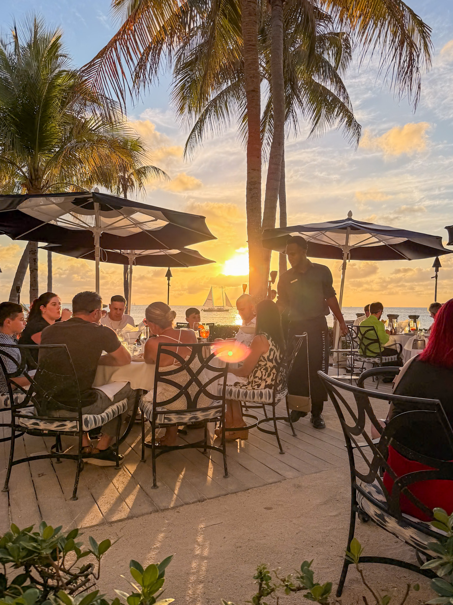 Latitudes vs Hot Tin Roof comparison showing waterfront dining in Key West