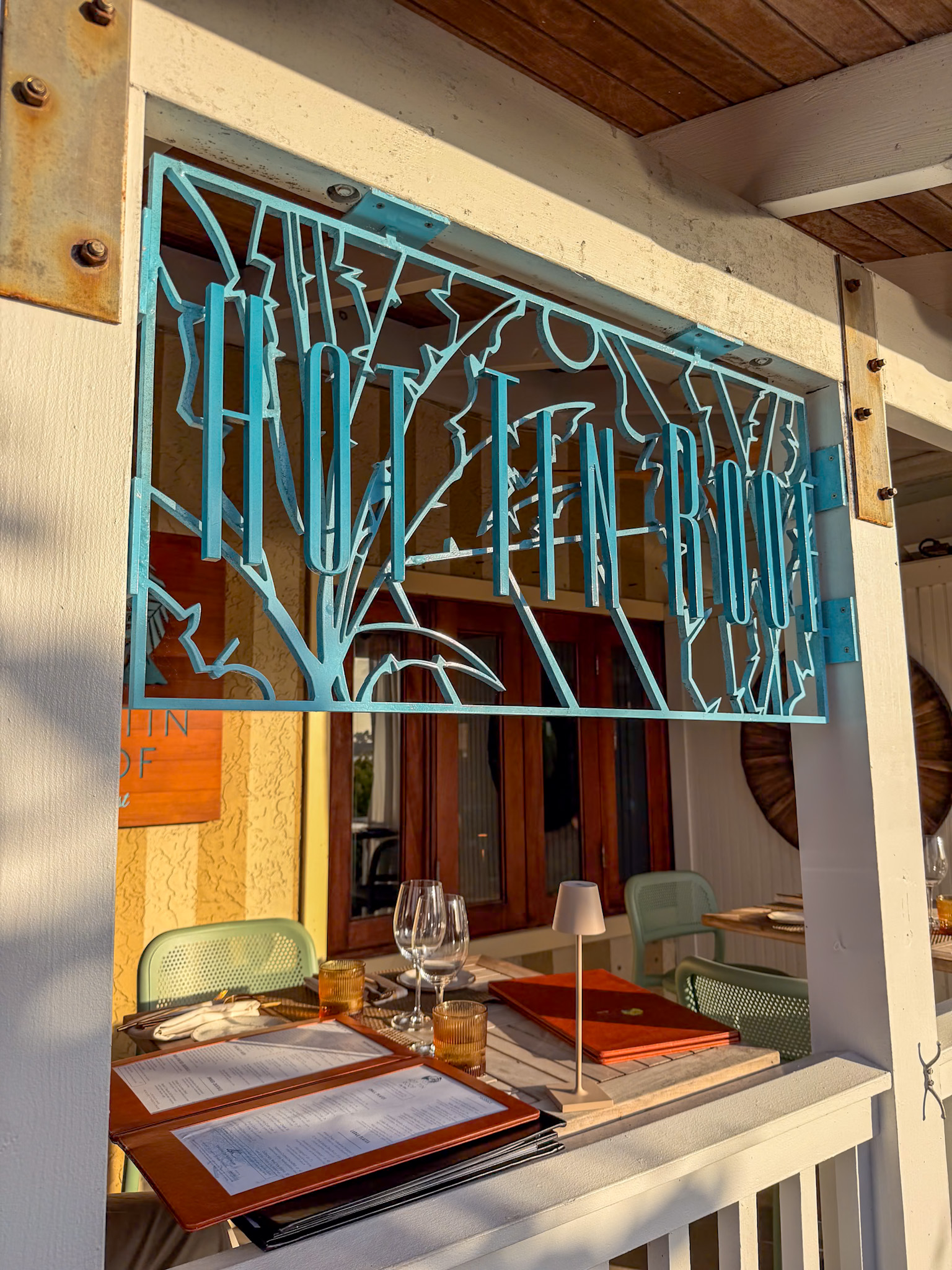 Outdoor waterfront seating at Hot Tin Roof Key West during sunset