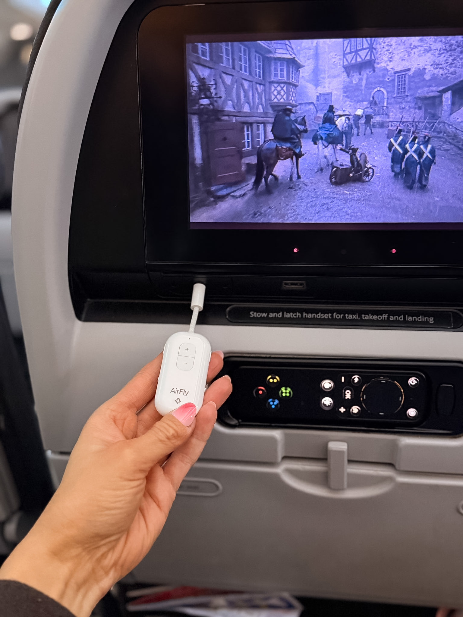 American Airlines international flight review showing seatback entertainment screen