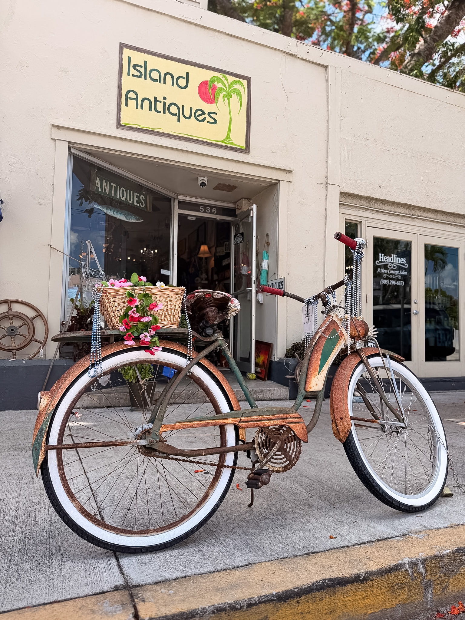 Best photo spots in Key West along a colorful street with pastel homes