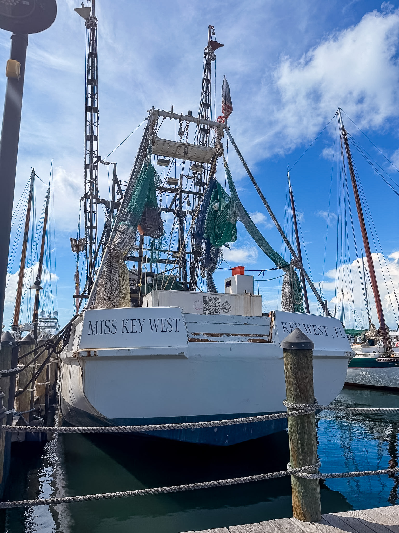 Best photo spots in Key West at the Historic Seaport with colorful boats and marina views