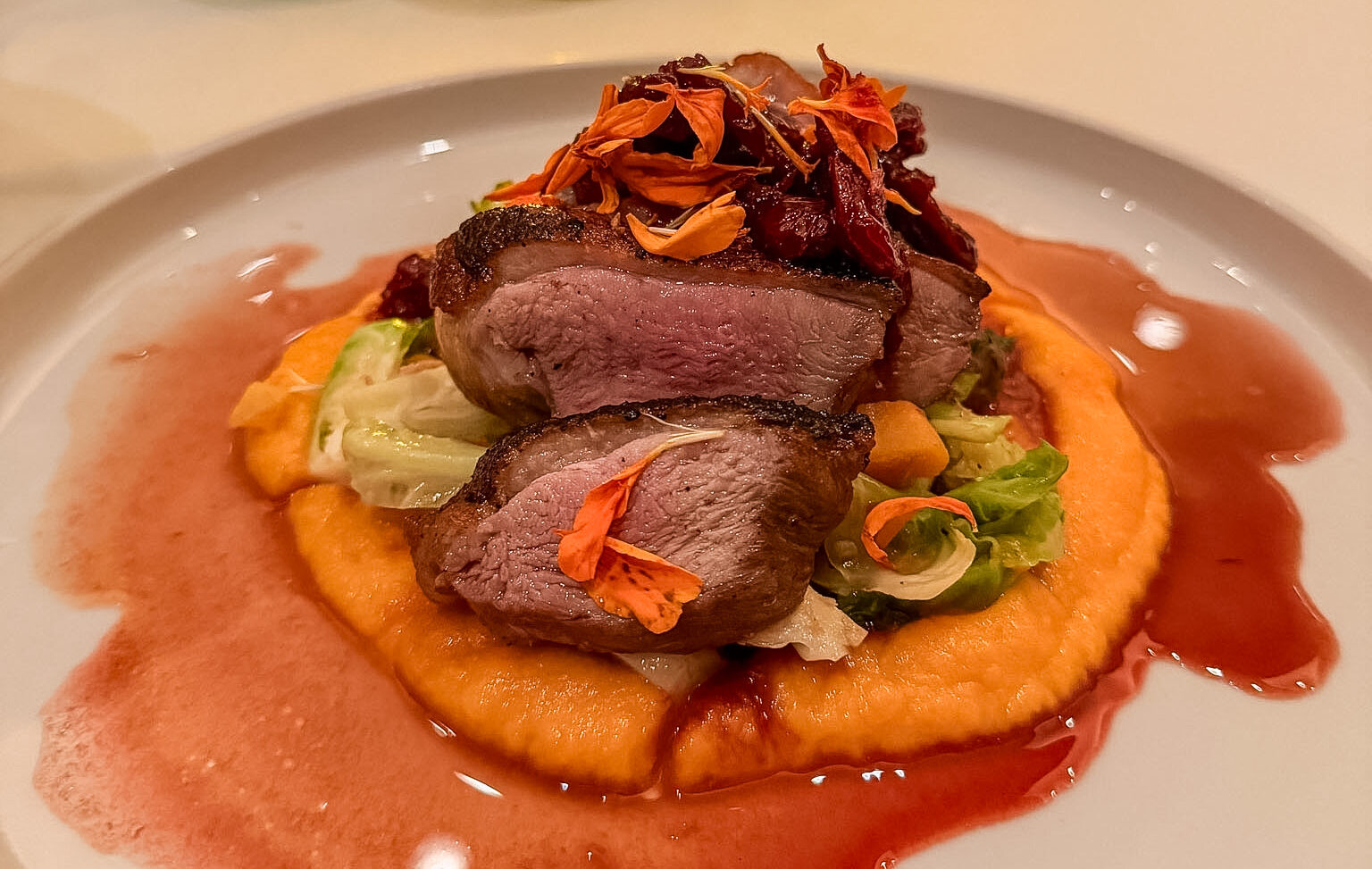 Maple Leaf Farms Duck Breast at Café Marquesa Key West with Brussels sprouts and butternut squash
