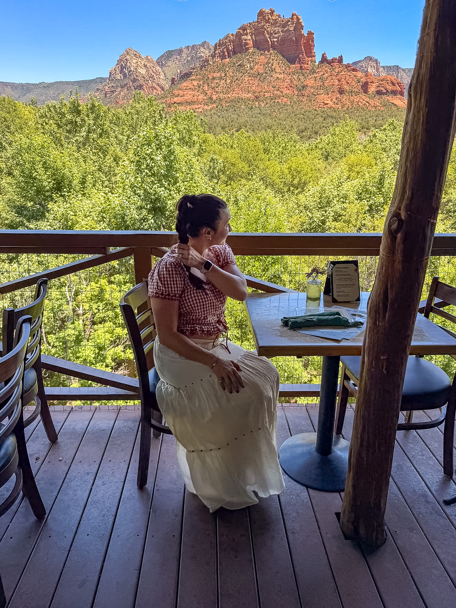 Hideaway House Sedona review showing the restaurant’s outdoor patio surrounded by trees