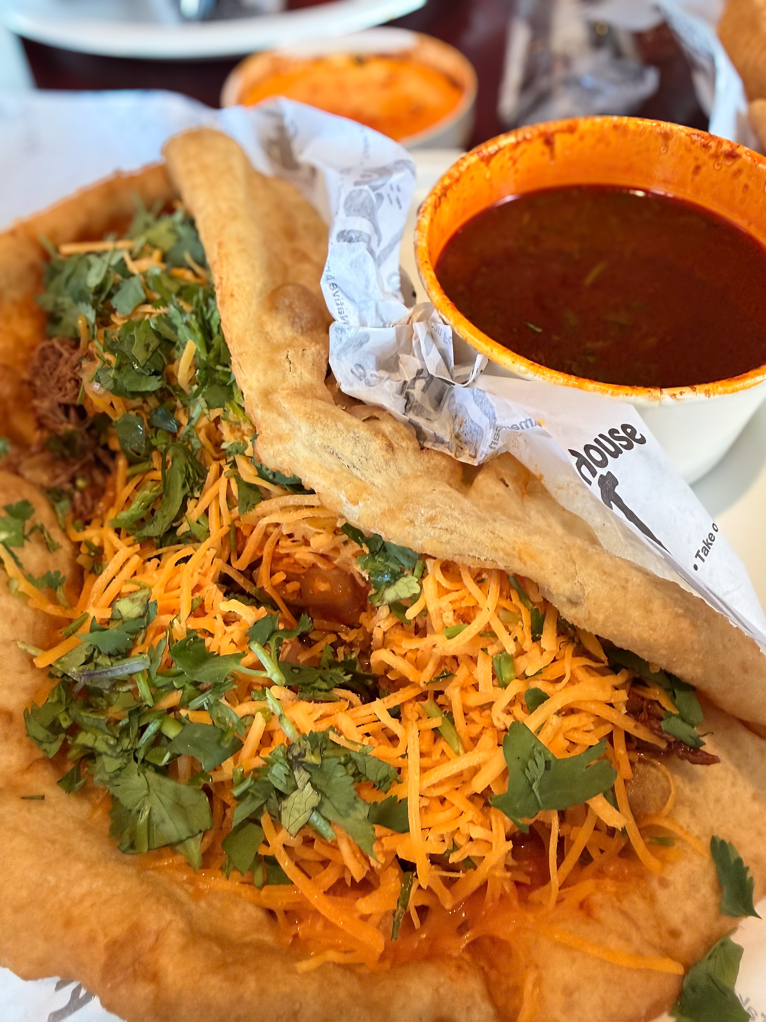 Ultimate Taco Fry Bread with birria at one of the best restaurants in Phoenix for local food
