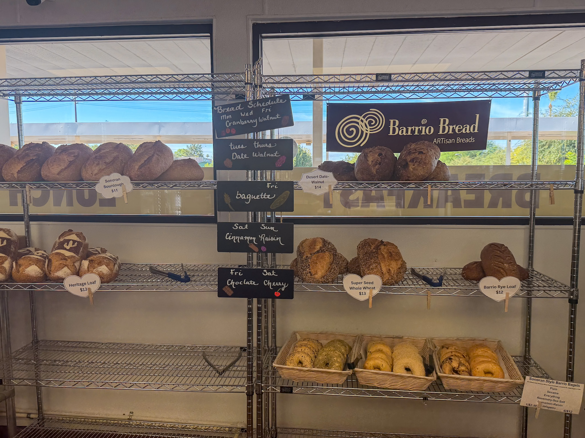 Bagels, pastries, coffee, and sourdough ordered for a Barrio Bagel review