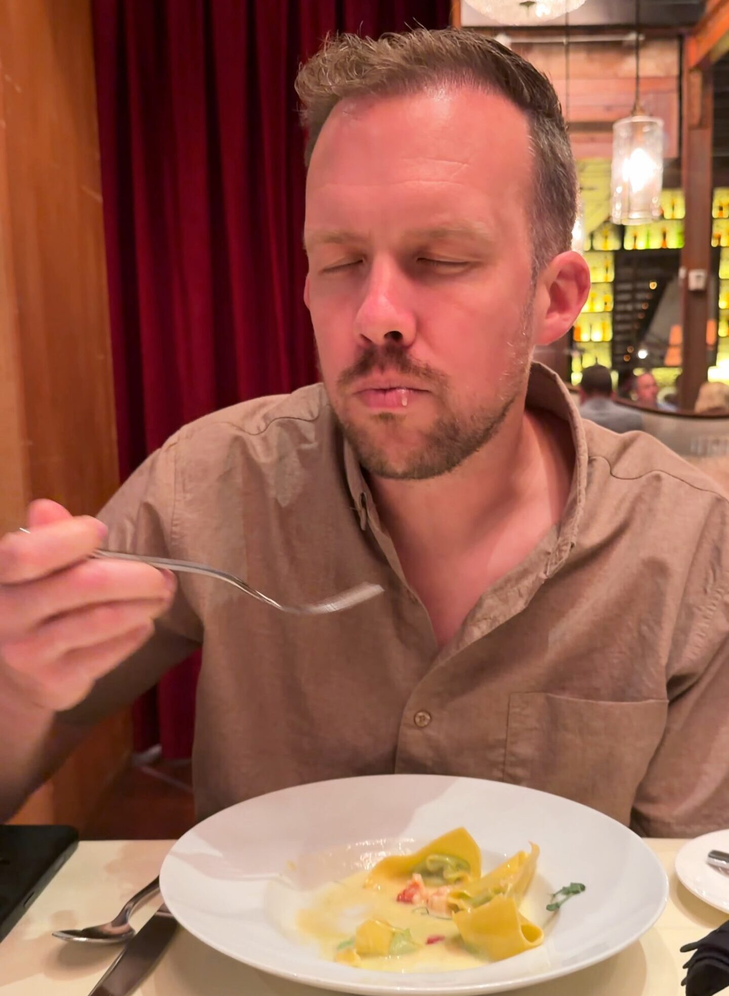 Boca Cincinnati Review showing Charred Leeks and Arpège Salad on the table
