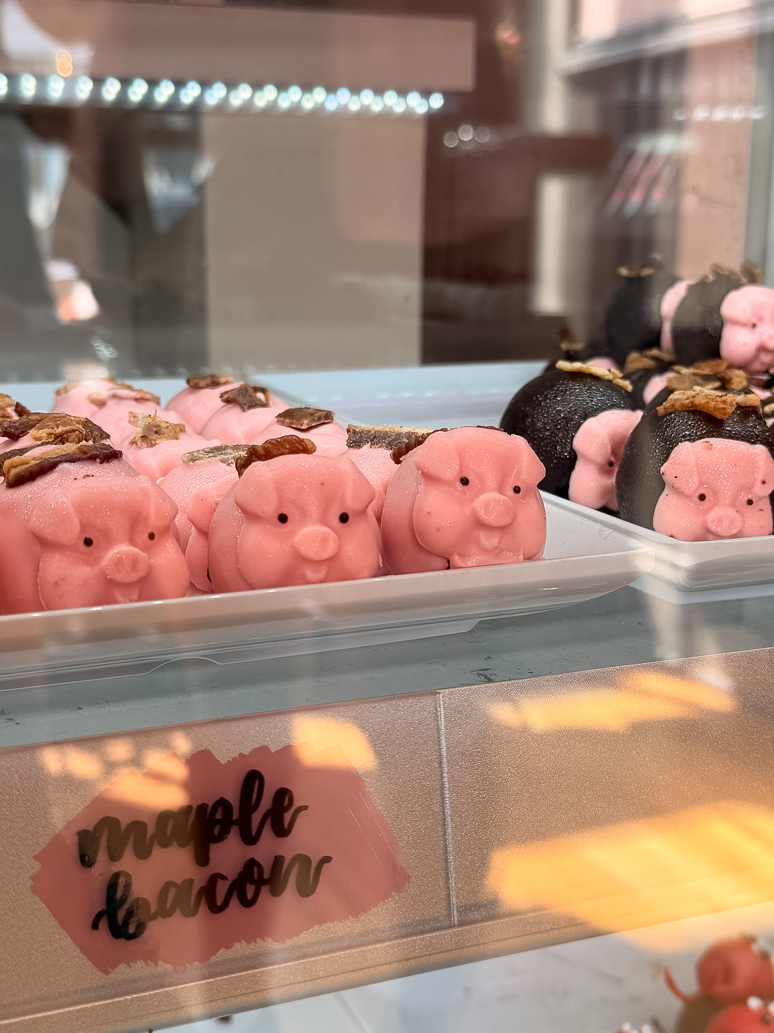Best Places to Eat in Cincinnati with a pig-shaped maple bacon chocolate from Ruby’s Chocolates