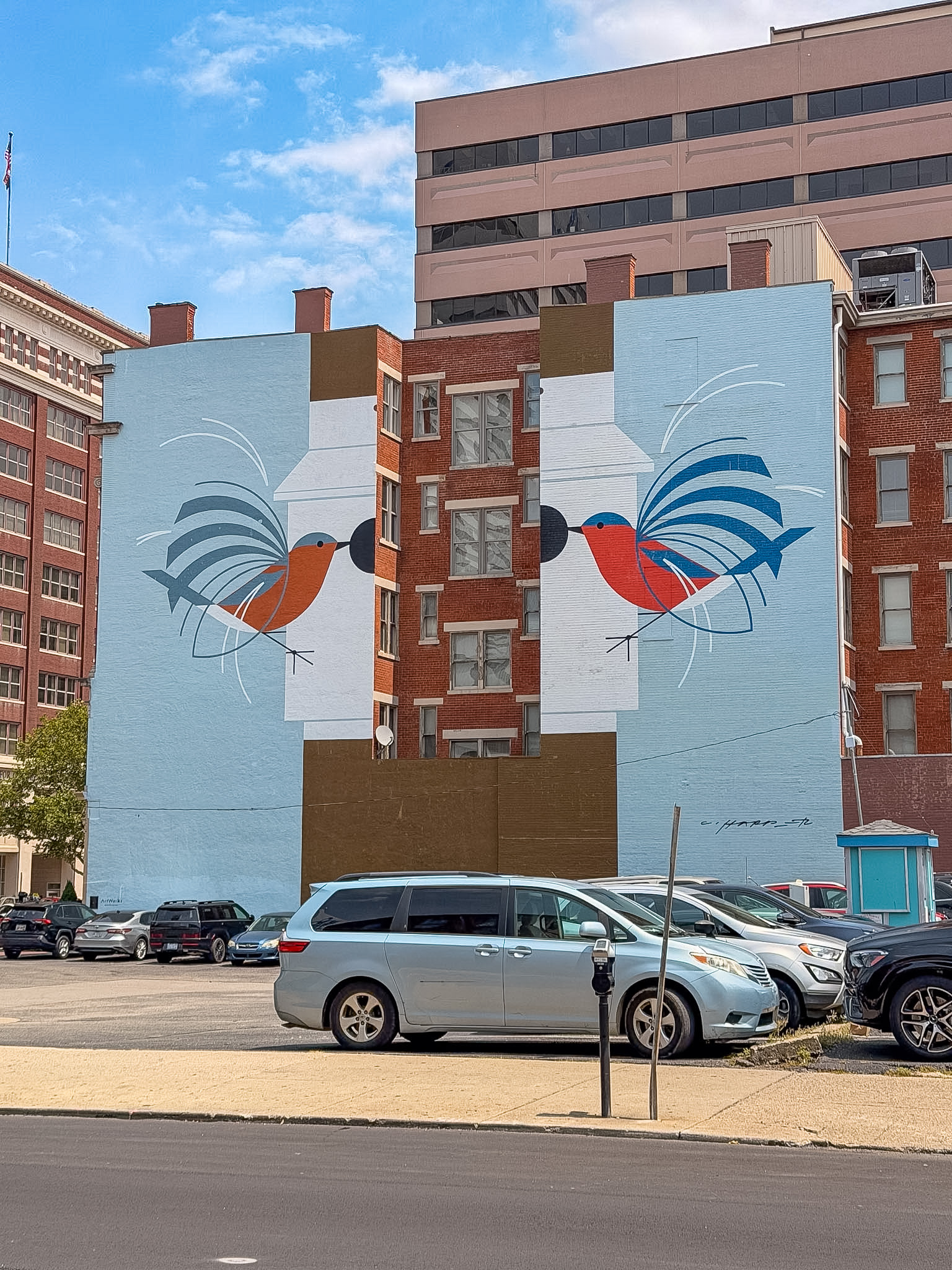 Best Cincinnati Murals including Charley Harper's Homecoming Blue Birds mural on East Court Street