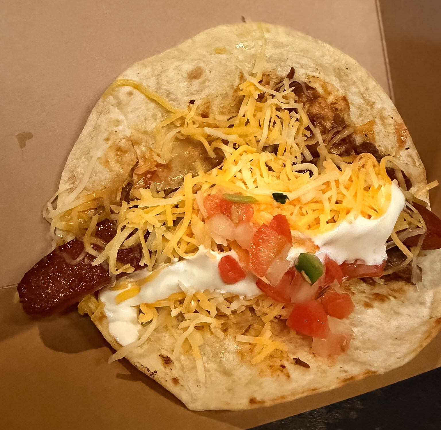 Best Places to Eat in Cincinnati featuring Cincinnati chili served over a hot dog at Jefferson Social