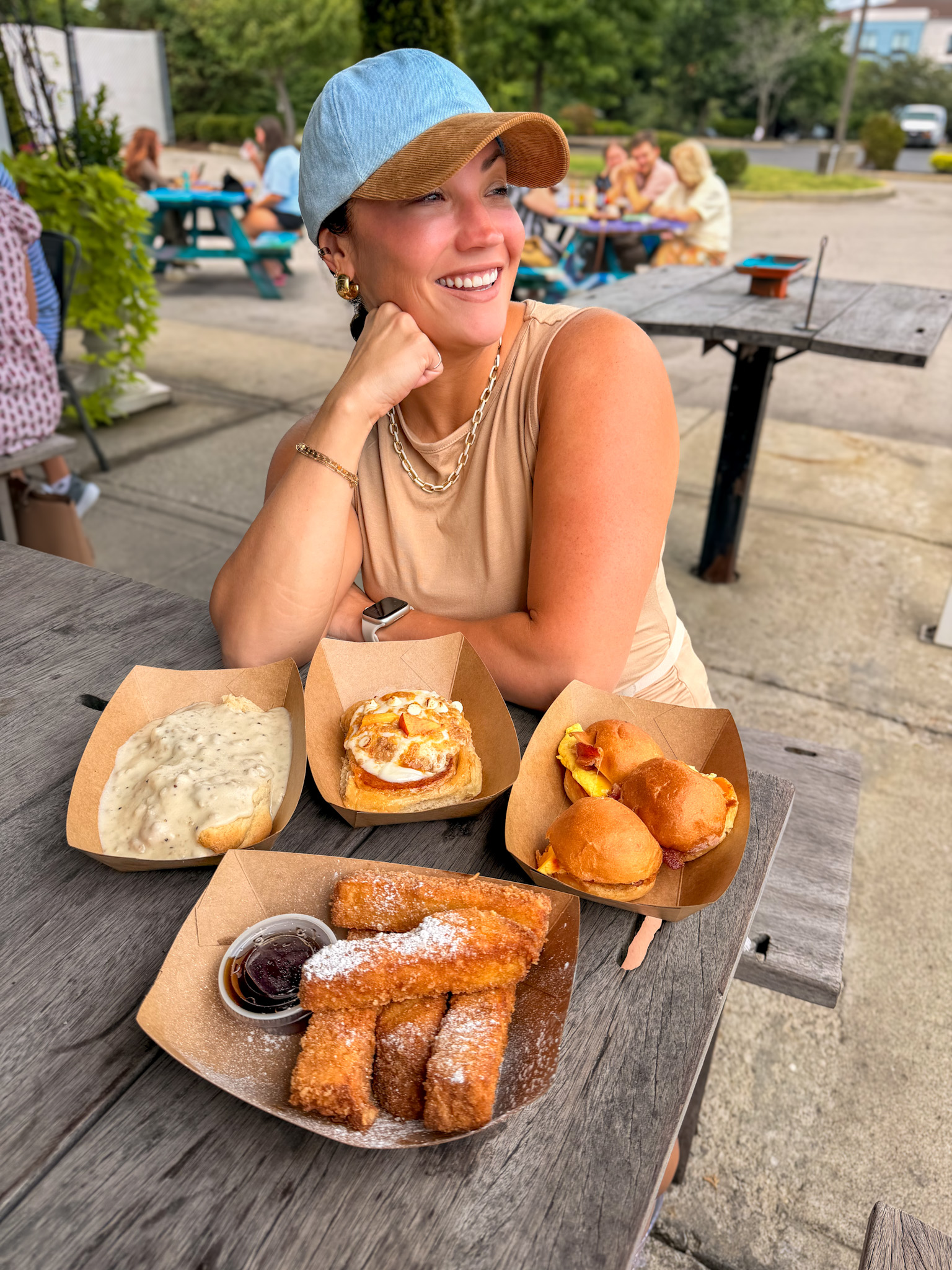 DV8 Kitchen Lexington Review featuring a large cinnamon roll with cream cheese frosting