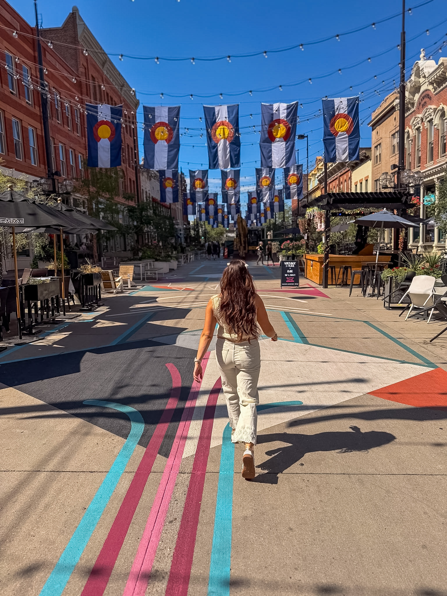 Larimer Square lights and historic buildings during one day in Denver