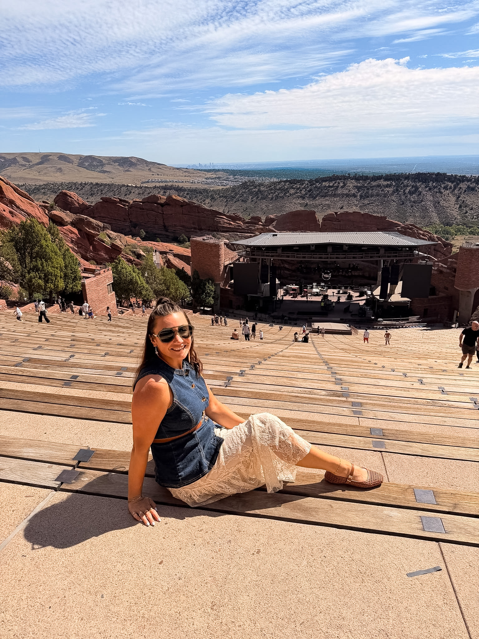 View of the stage and seating inside Red Rocks Amphitheatre during a daytime visit