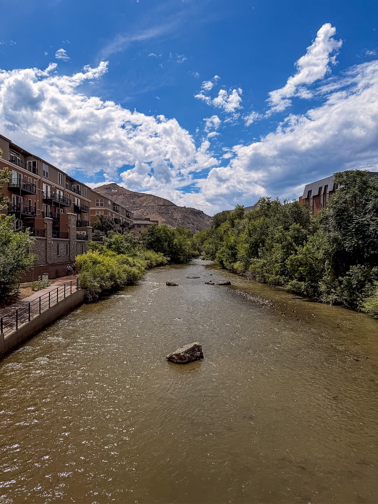 Clear Creek running through downtown during one day in Golden Colorado