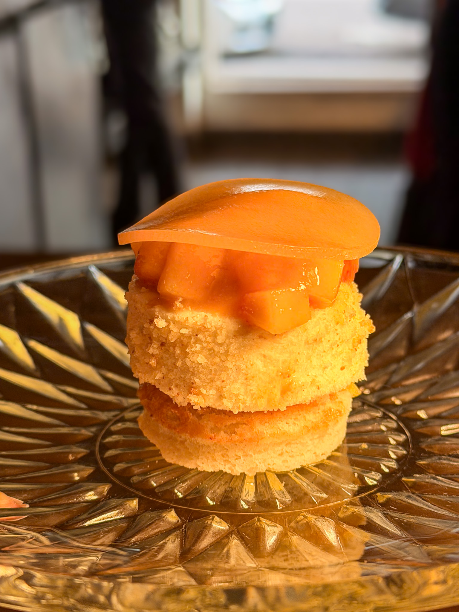 BRUTØ Denver review showing the light sake fermentation dessert with local peaches