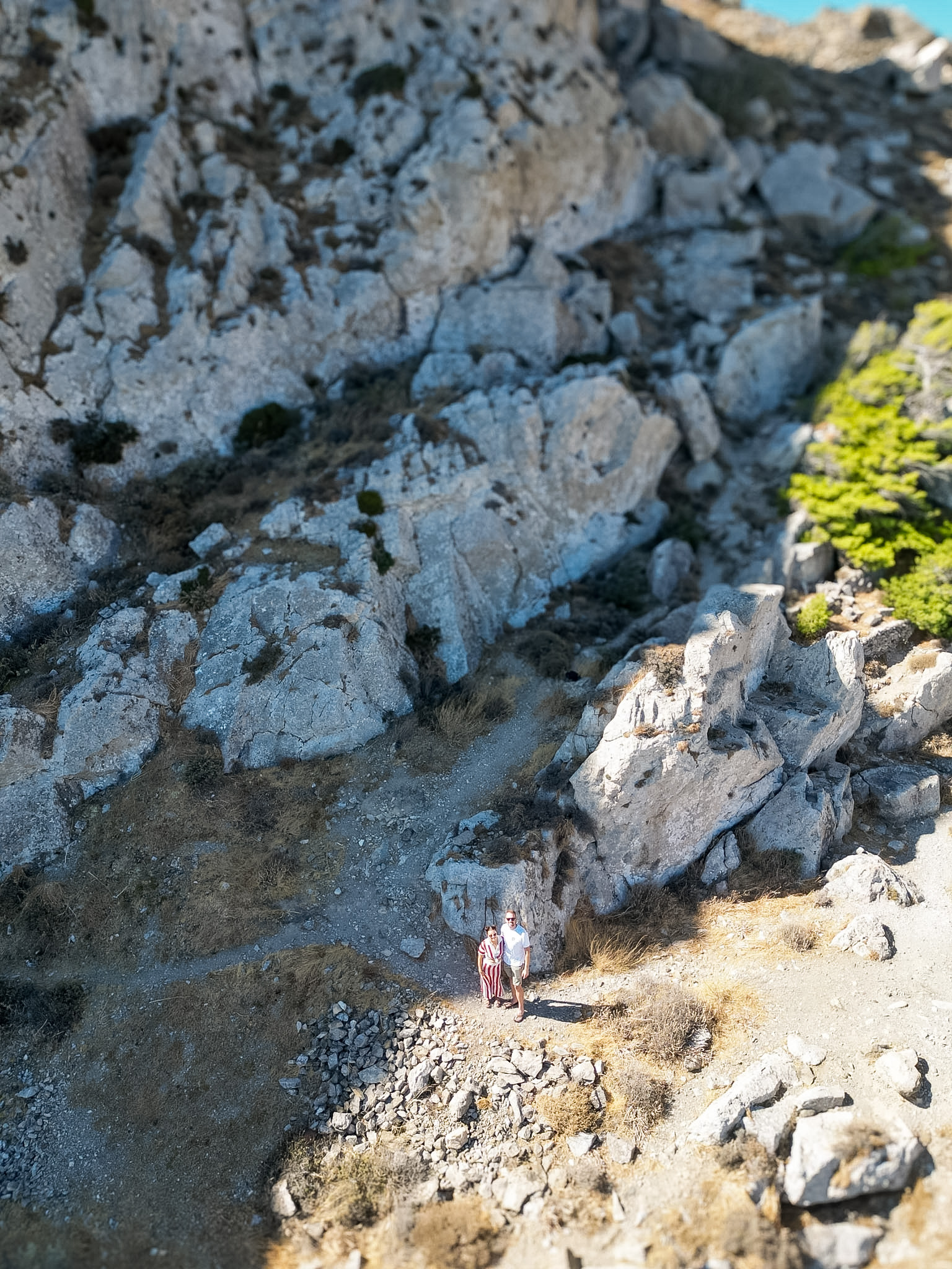 Rocky uphill walking path leading to the Ancient Thera archaeological site