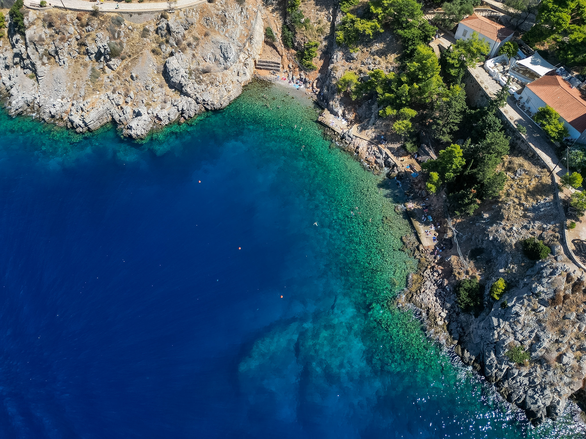 Scenic coastal walking path between Avlaki Beach and Kamini Harbor on Hydra.