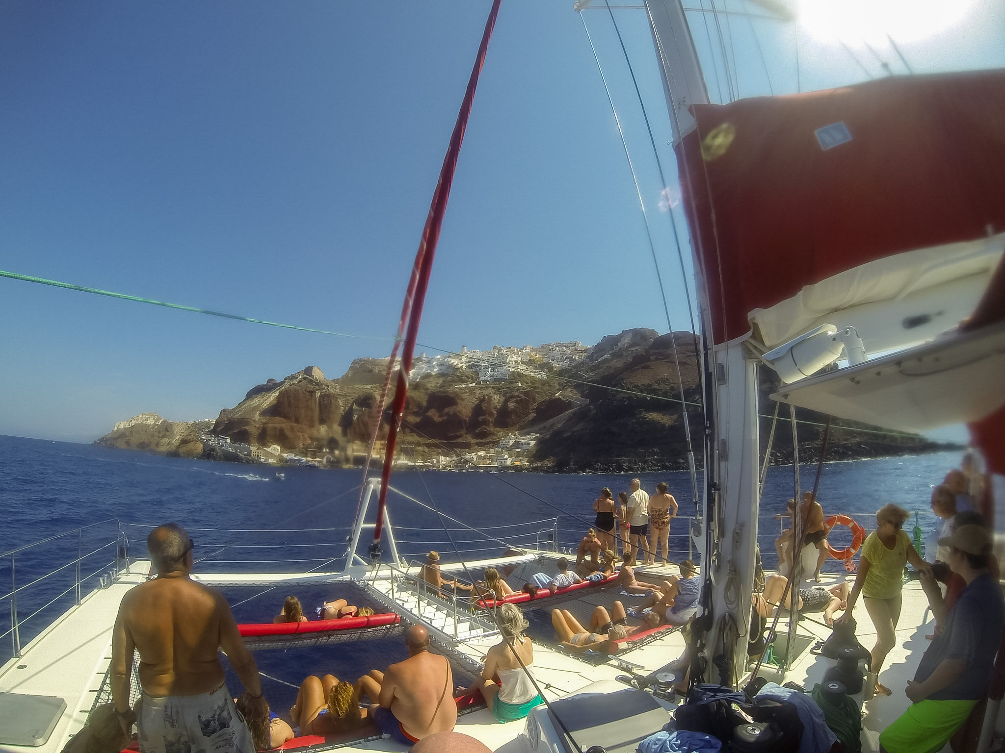 Front lounging nets on a Santorini catamaran cruise