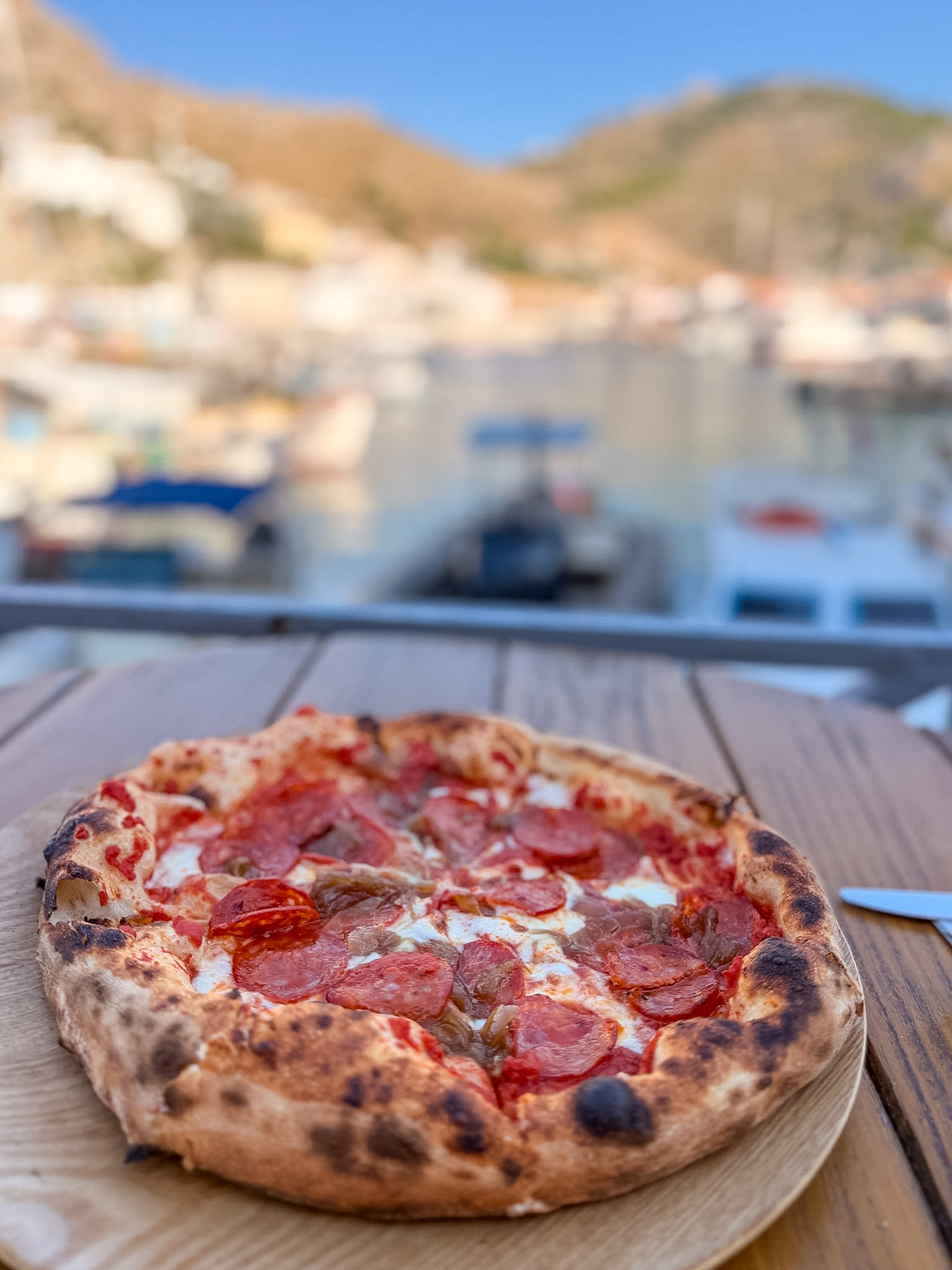 Pepperoni sourdough pizza at Papagalos restaurant overlooking Hydra Harbor.