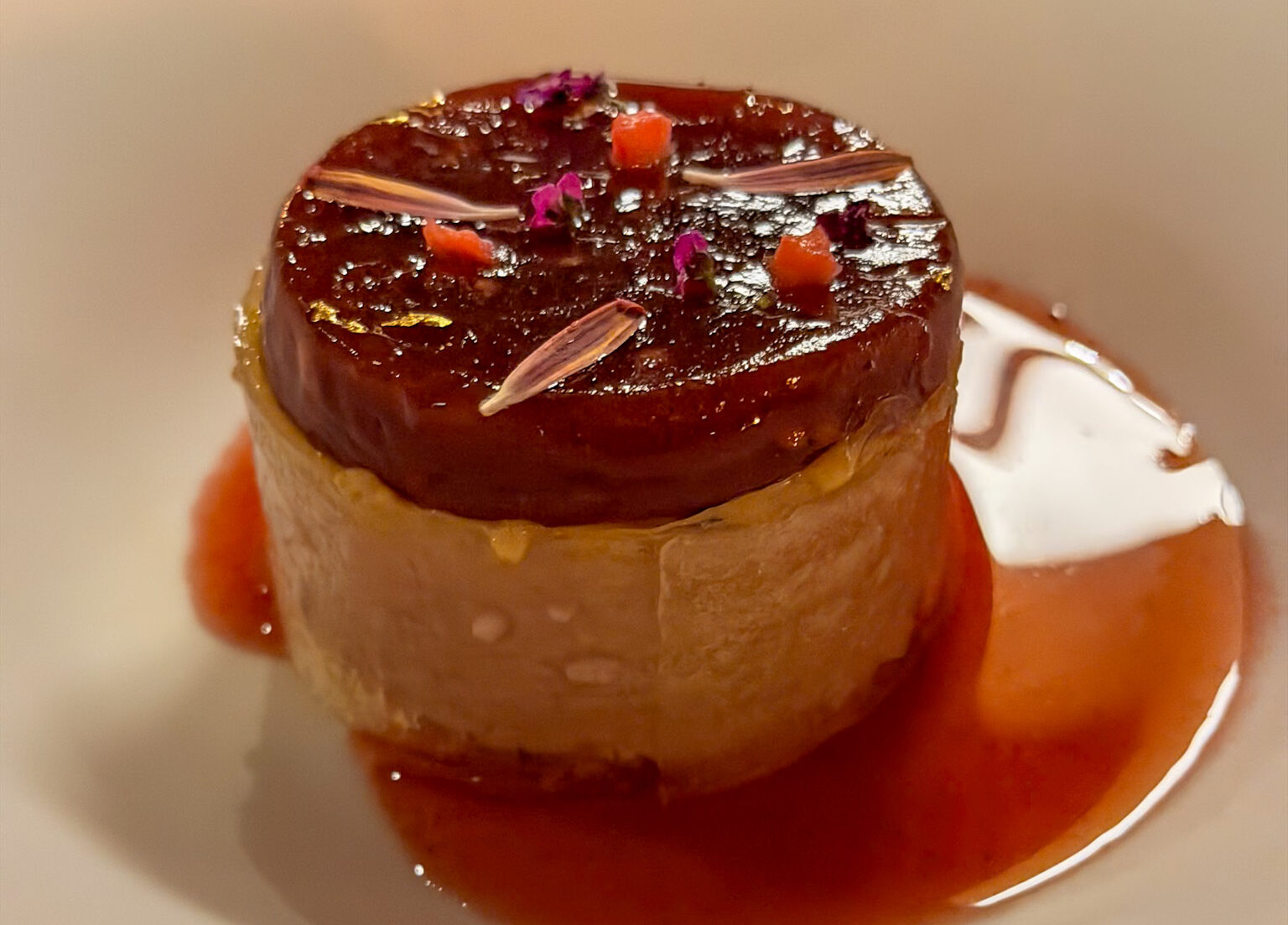 Artistic dessert featuring Vinsanto, eggplant, and strawberry at Selene Santorini