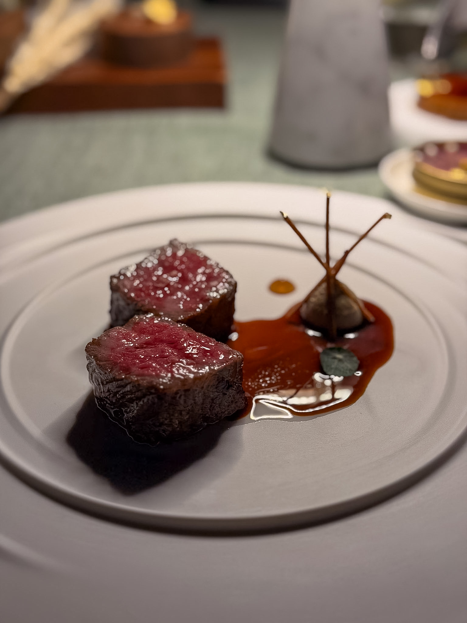 Wagyu striploin main course with accompaniments at Lycabettus Restaurant Santorini